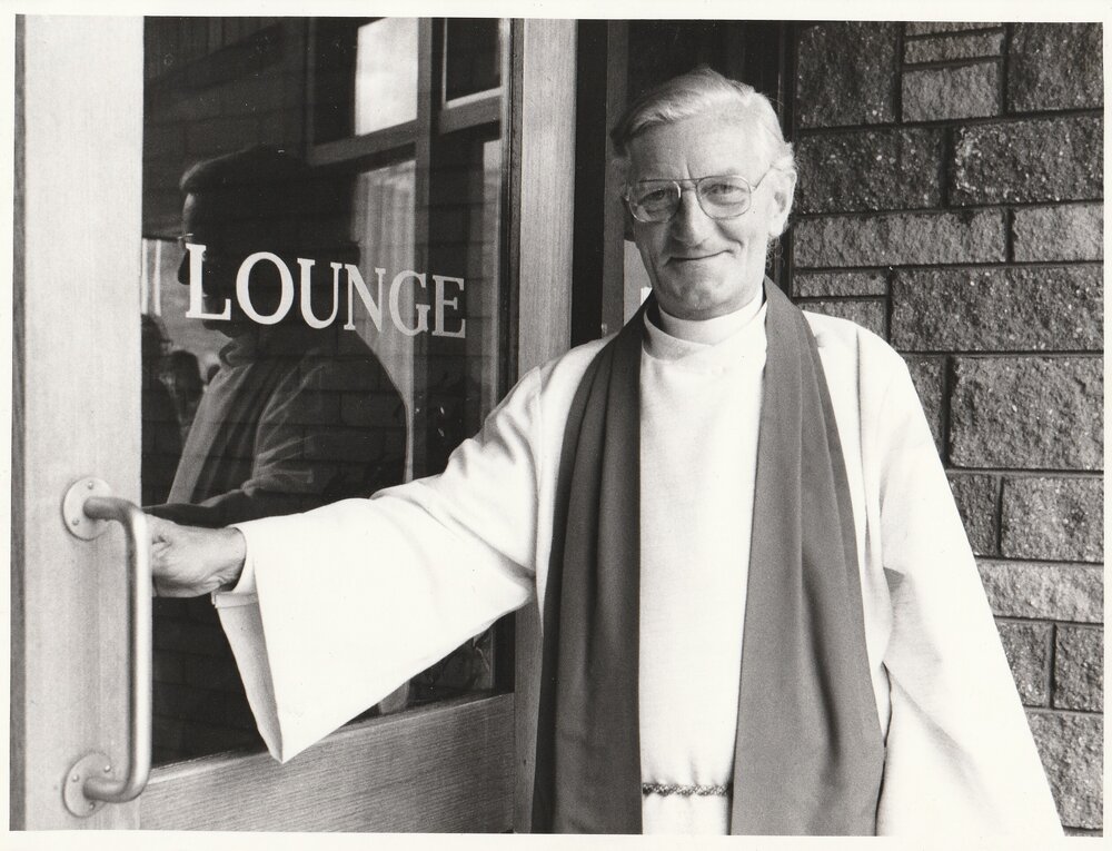 Moderator Rev Graham W Hardy opens the door to a non-alcoholic bar.