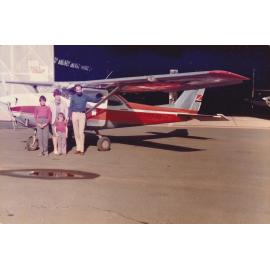 Far West Mission. Rev Chris Sparks and family, with the plane in the Bourke hangar