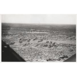 Far West Mission. Aerial view of Hungerford, cut in half by the Border Fence 